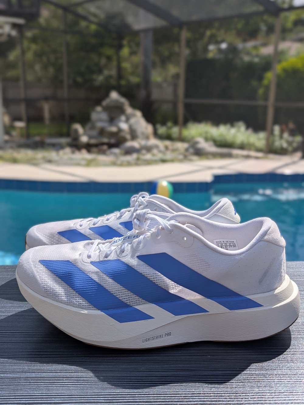 adidas Adizero Evo SL "White Blue Fusion" - Women's US 10 (JS4454)
